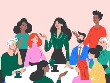 a group of people sitting during a meeting