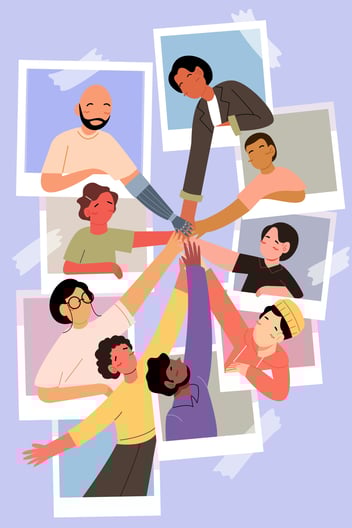 a group of people putting their hands together