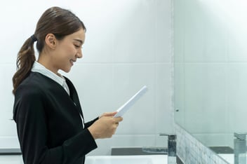 woman looking at her resume