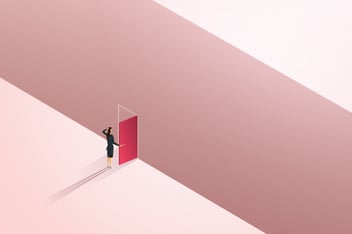 woman opening door to empty space